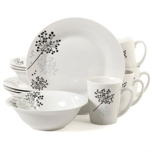 Gibson Netherwood 12-piece dinnerware set with white ceramic plates and bowls, modern design, on a neutral background