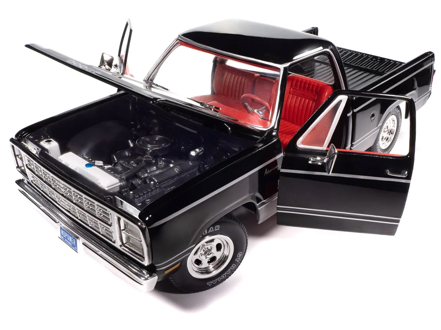 1979 Dodge Adventurer Sweptline pickup truck diecast model by Auto World, black with red interior, part of American Muscle Series 1/18 scale.