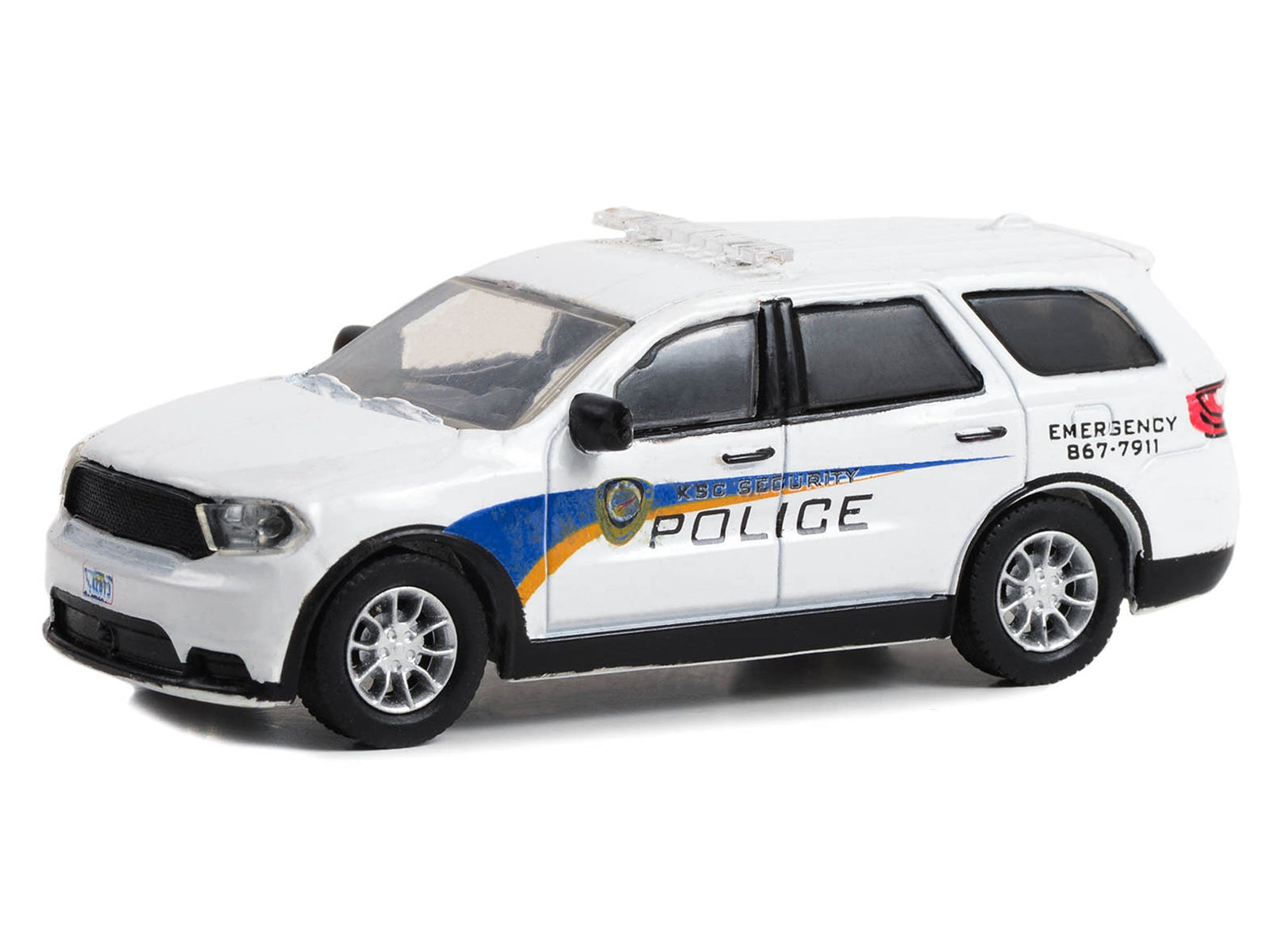 White 2017 Dodge Durango diecast model car with KSC Security Police graphics, part of Greenlight's Hobby Exclusive Series, 1/64 scale.