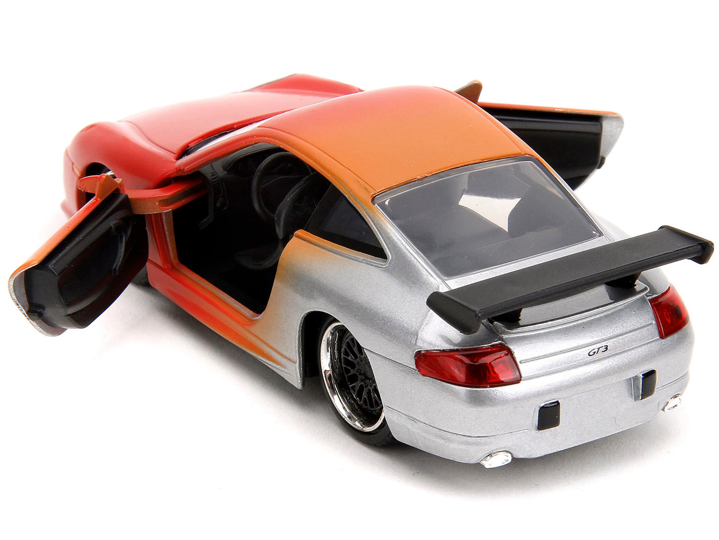 Diecast model car of Porsche 911 GT3 RS in matte orange and silver, part of Jada's Pink Slips Series, 1/32 scale.
