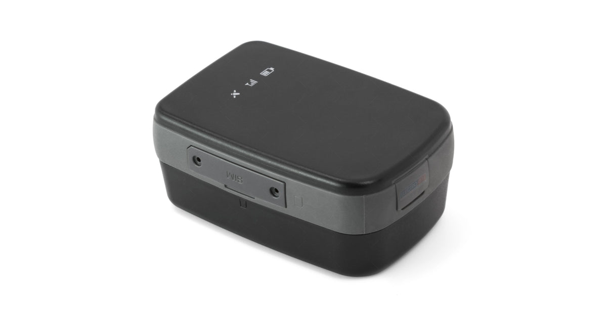 Portable American Smart WB GPS vehicle tracking device, real-time tracker with easy mount for accurate vehicle location monitoring.
