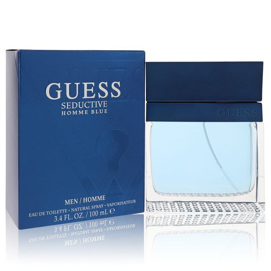 Guess Seductive Homme Blue men's eau de toilette spray in 3.4 oz bottle, featuring sleek packaging and vibrant blue accents.