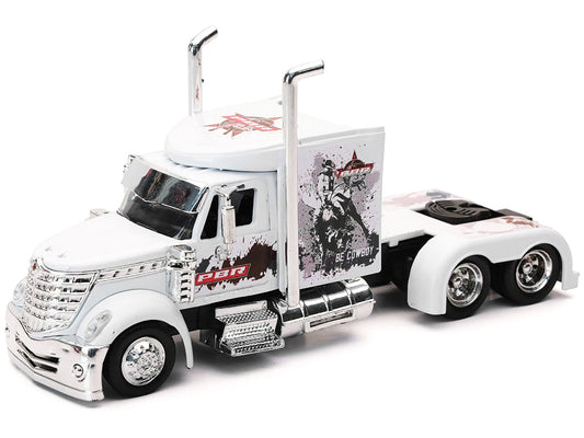 White International Lonestar truck tractor diecast model by New Ray, featuring "PBR Professional Bull Riders" branding.