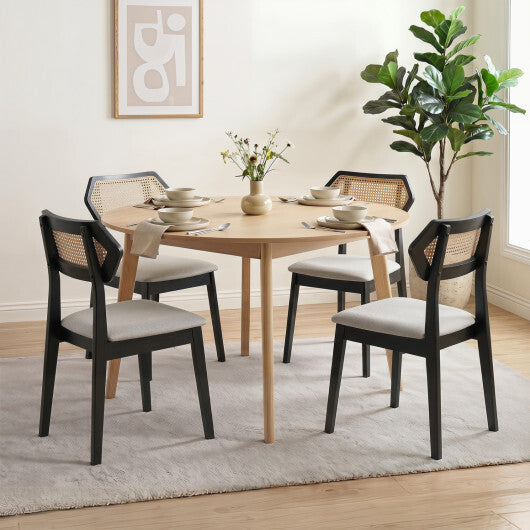 Set of 2 black mid-century rattan dining chairs with rattan backs and solid wood frames, ideal for kitchen and dining room.