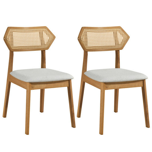 Set of two Mid Century Rattan Dining Chairs with black rattan backrests and solid wood frames, perfect for kitchen and dining spaces.