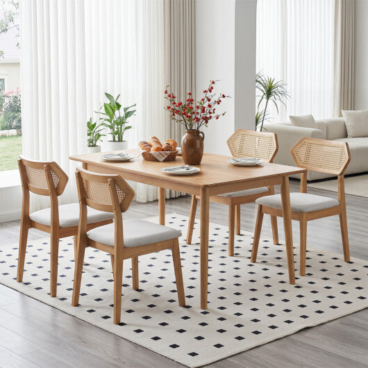 Set of two American Smart mid-century rattan dining chairs with rattan backrests and solid wood frames in black.