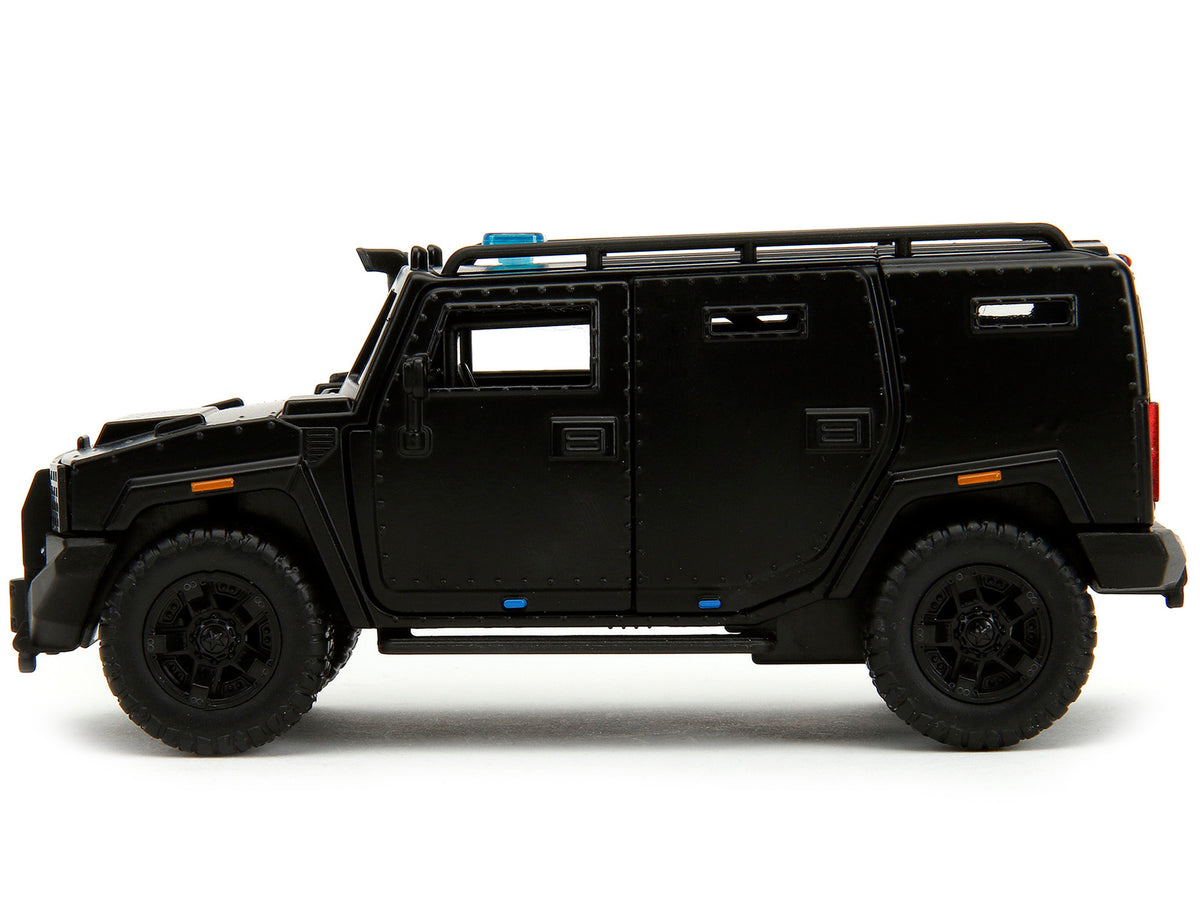 Black 1/32 diecast model of the Agency SUV "Fast X" from Fast & Furious series by Jada, featuring detailed movie-inspired design.