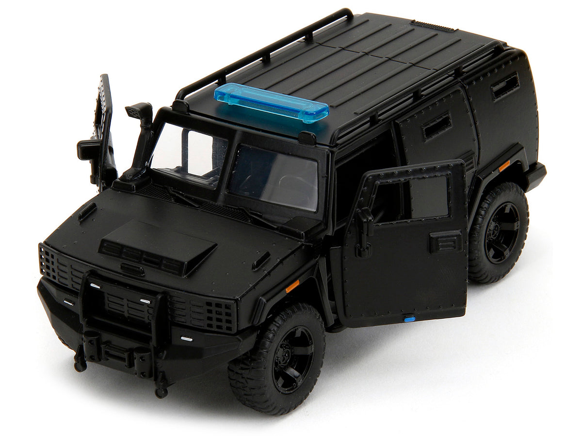 Black 1/32 diecast model of the Agency SUV "Fast X" from Fast & Furious series by Jada, showcasing detailed exterior design.