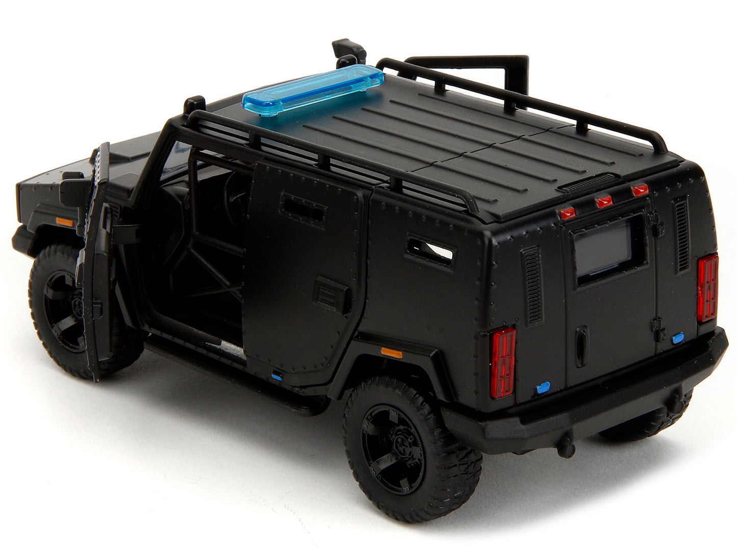 Black 1/32 diecast model of Agency SUV "Fast X" from Fast & Furious series by Jada, featuring detailed exterior design.