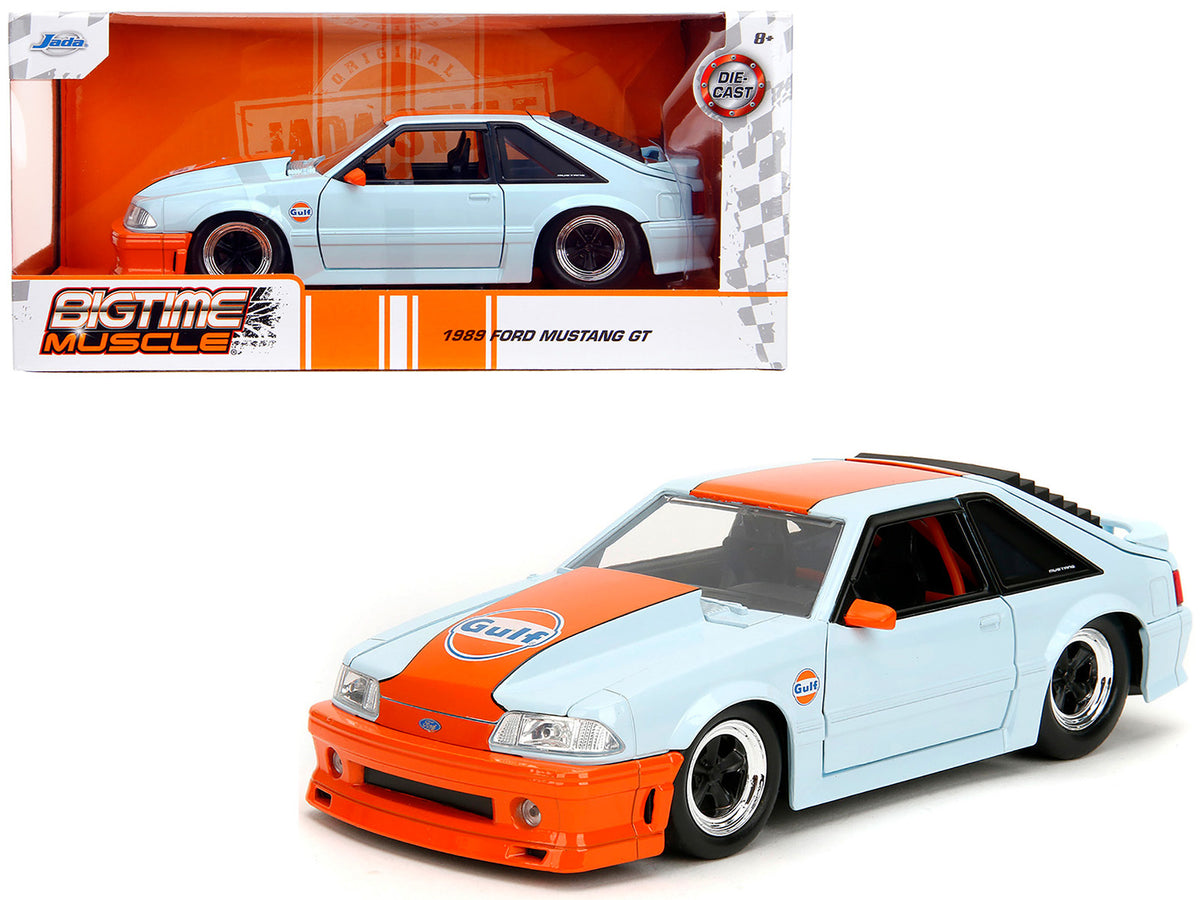 Light blue 1989 Ford Mustang GT "Gulf Oil" diecast model car with orange stripe, part of Bigtime Muscle series by Jada, American Smart.
