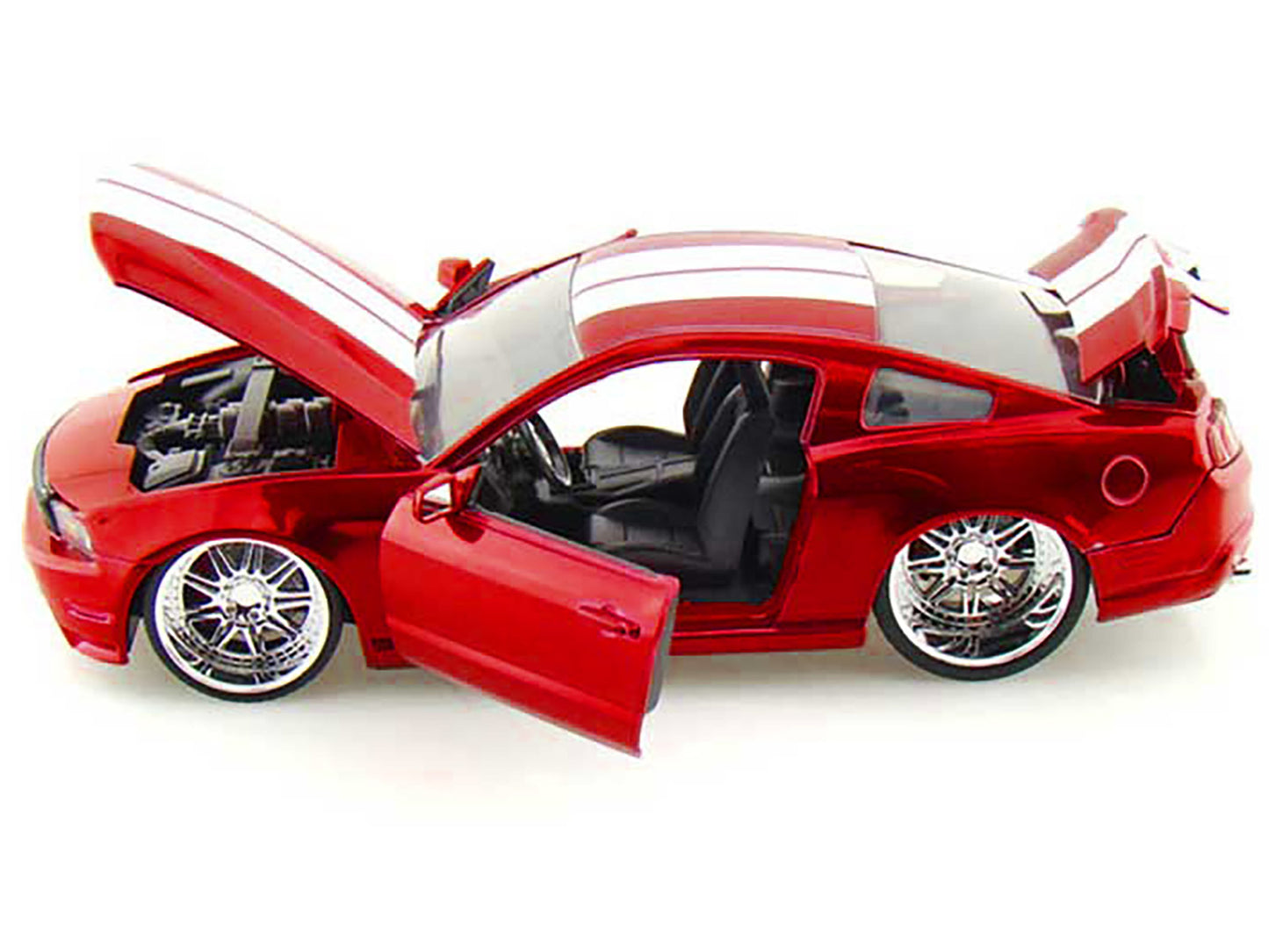Red metallic 2010 Ford Mustang GT diecast model with white stripes, part of the Bigtime Muscle Series by Jada, American Smart - WB.