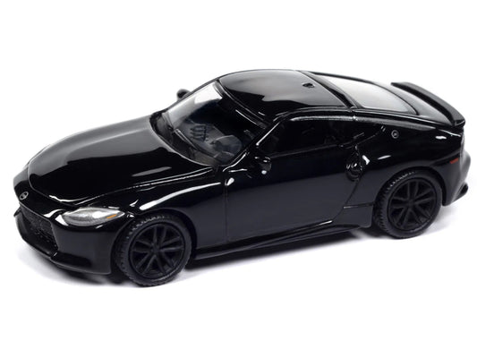 2023 Nissan Z Black Diamond diecast model car by Auto World, part of the Import Legends Series, in black finish with detailed features