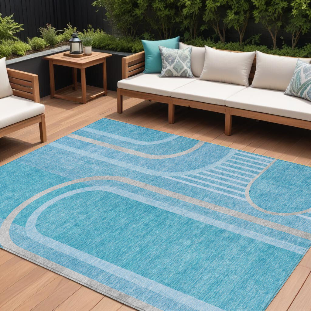 American Smart teal abstract outdoor area rug, 10x14 feet, washable indoor-outdoor rug with modern design and durable material.