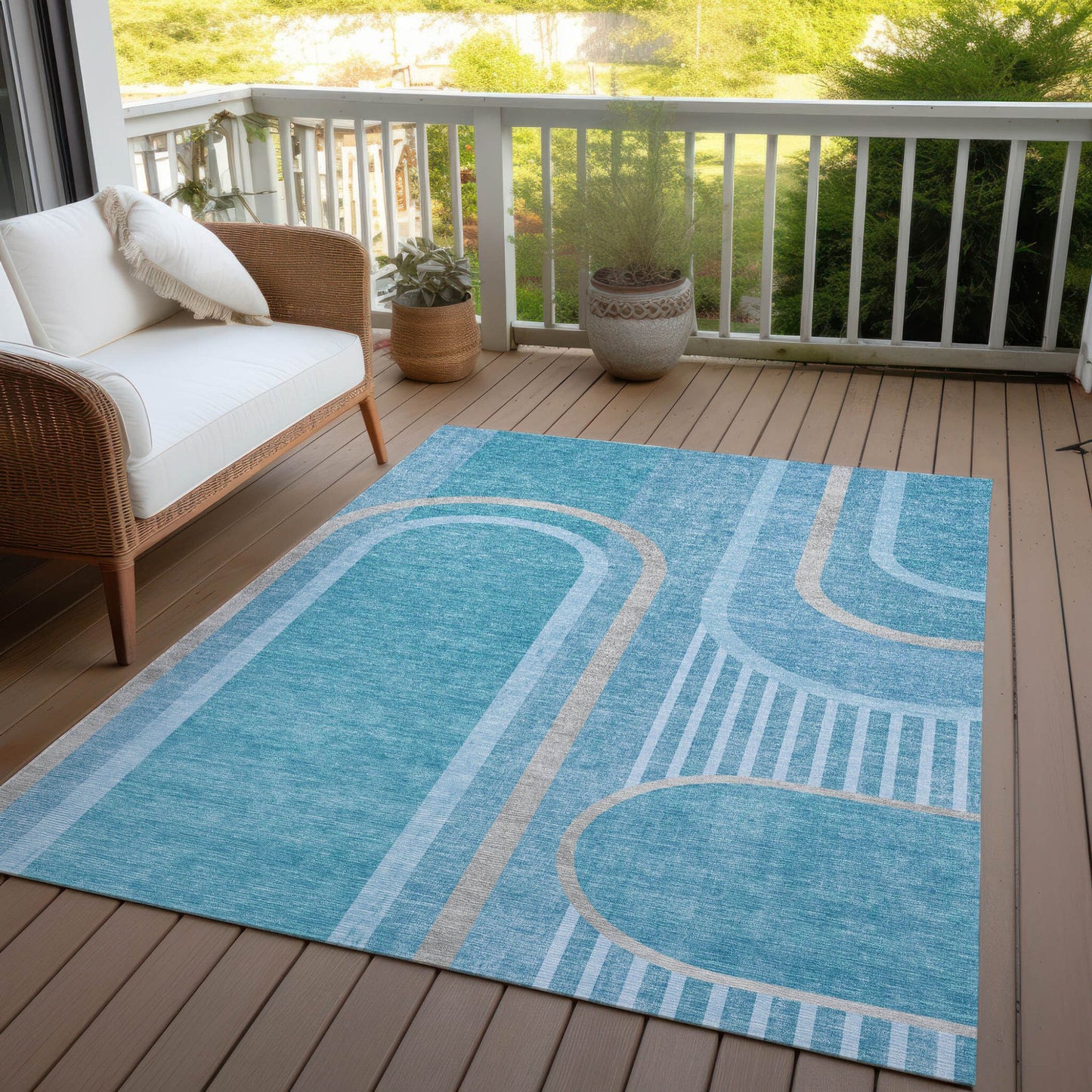 10' x 14' teal abstract washable indoor outdoor area rug by American Smart, featuring a vibrant, modern design for versatile spaces.