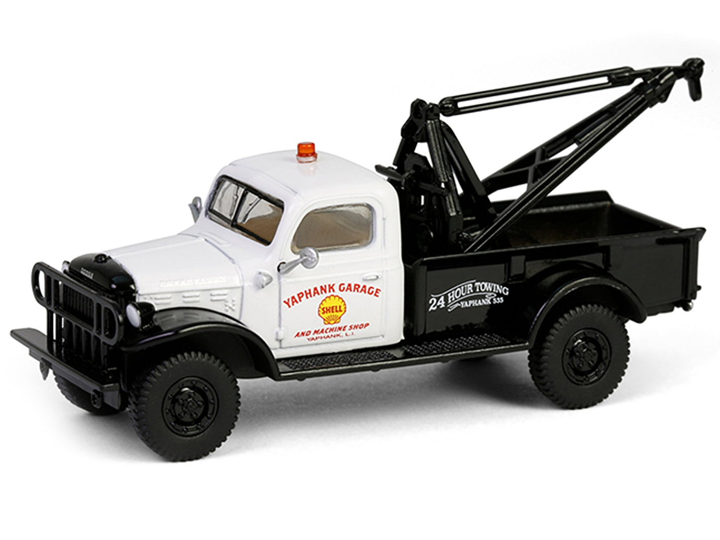 1945 Dodge Power Wagon Wrecker Tow Truck diecast model by Greenlight, white and black Shell Oil "Running on Empty" series, 1/64 scale.