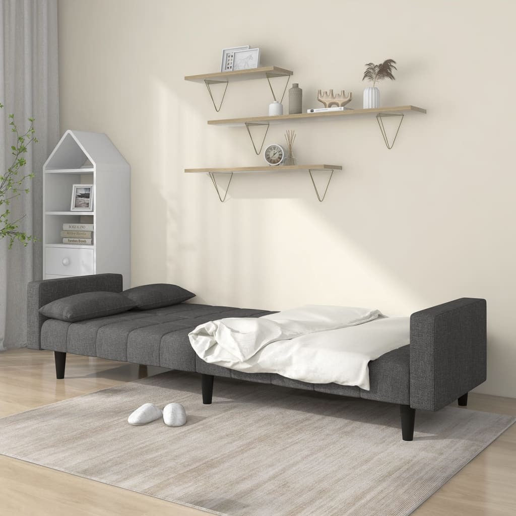 Dark gray fabric 2-seater sofa bed with two pillows, American Smart WB, showcasing a modern and comfortable living room piece.