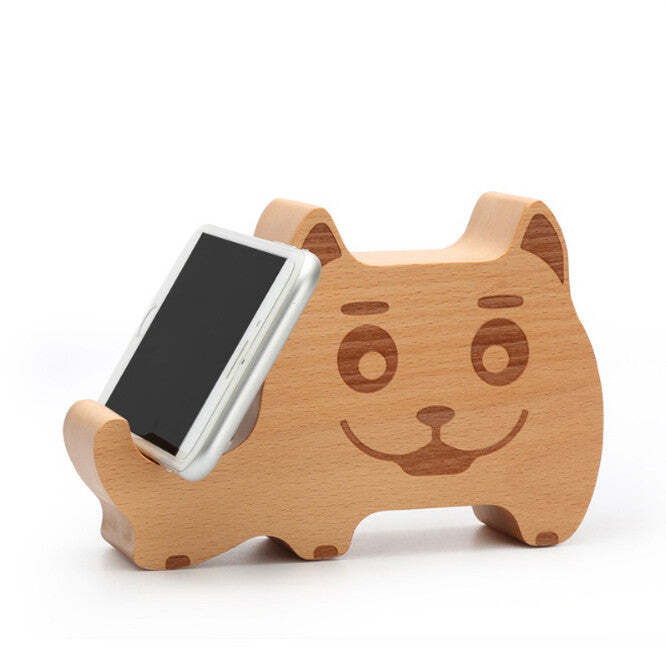 American Smart WOODSY GOODSY 2-in-1 Bluetooth speaker and cell phone stand showing wooden finish and compact design.