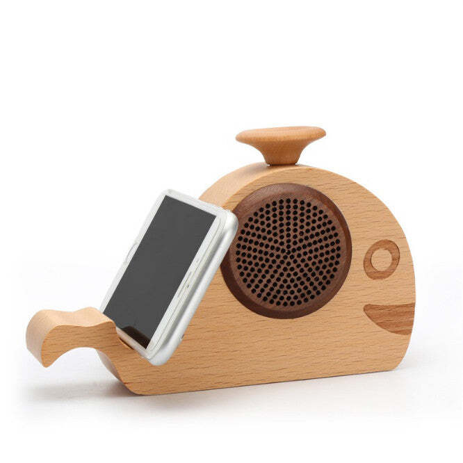 American Smart WOODSY GOODSY 2-in-1 Bluetooth speaker and cell phone stand showing wooden design with buttons and phone holder