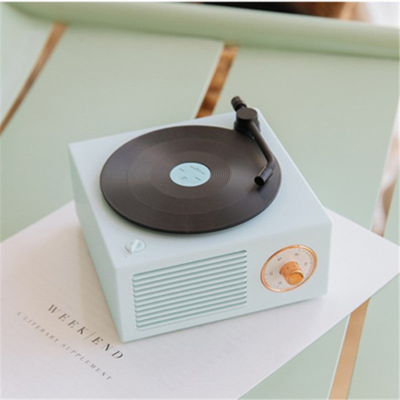 American Smart WB Retro Atomic Record Player Bluetooth speaker with wireless audio and compact, vintage-inspired design.