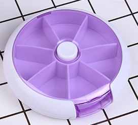 American Smart portable rotating medicine box with 7 compartments, compact storage bottles for organized medication management.