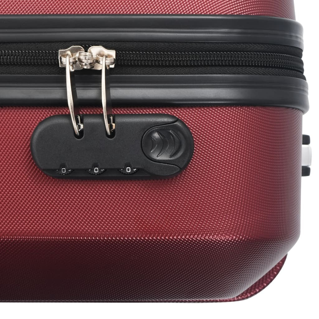 Set of three American Smart hardcase trolley suitcases in wine red ABS with sturdy wheels and telescopic handles.