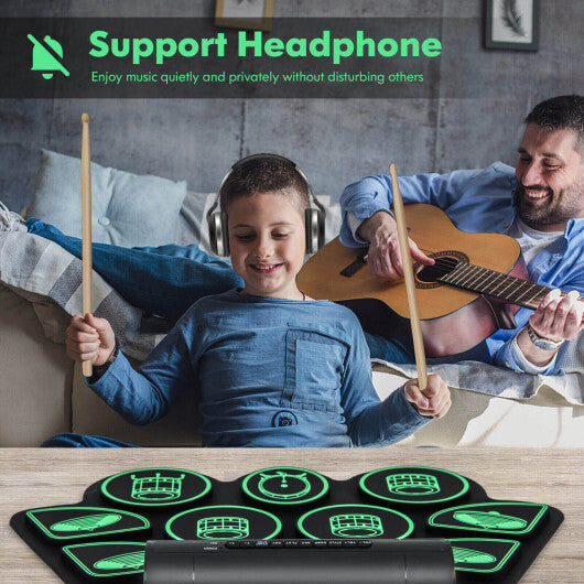 Green electronic drum set for kids with two built-in stereo speakers, American Smart brand, colorful toy musical instrument.