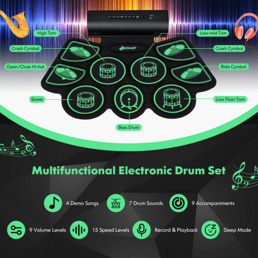 American Smart green electronic drum set for kids with built-in stereo speakers, featuring colorful drum pads and control panel.