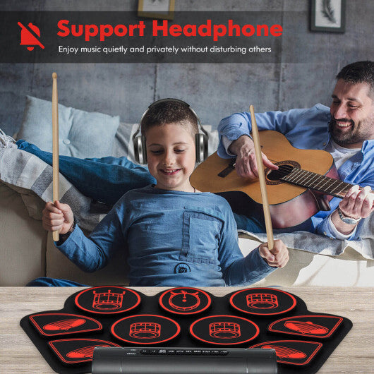 Red American Smart electronic drum set for kids with two built-in stereo speakers, featuring colorful drum pads and control panel.