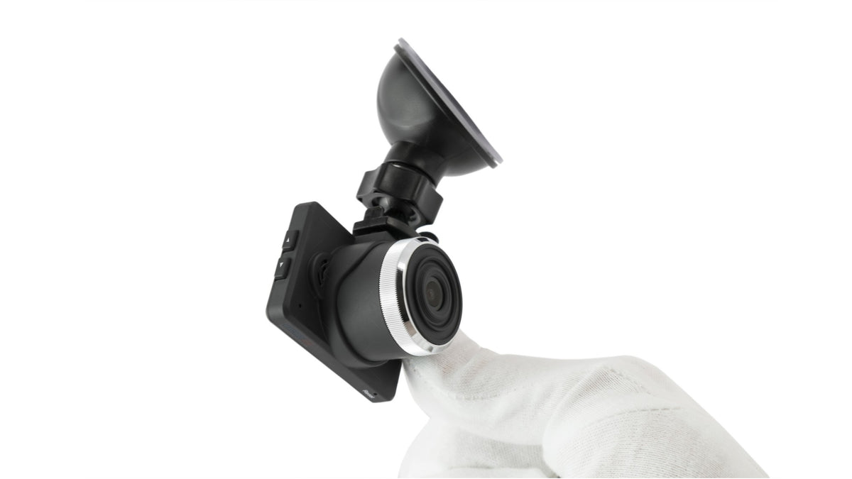 American Smart WB iDrive DVR camera with in-dash LCD screen capturing video footage for vehicles.