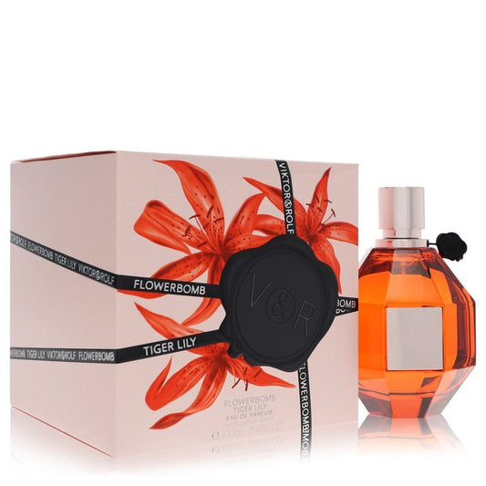 Viktor & Rolf Flowerbomb Tiger Lily Eau De Parfum spray bottle for women, 3.4 oz, with floral design and elegant packaging.