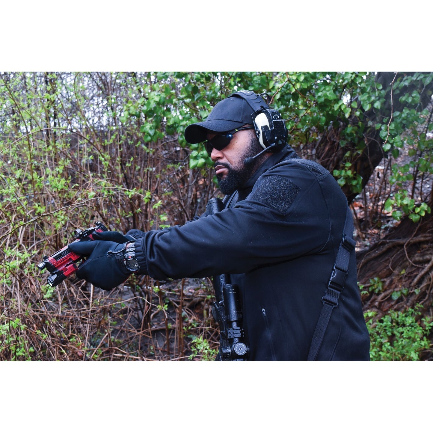 American Smart Walker's Game Ear GWP-RZRWT Razor walkie talkie for outdoor communication, showing the compact device with buttons and antenna.