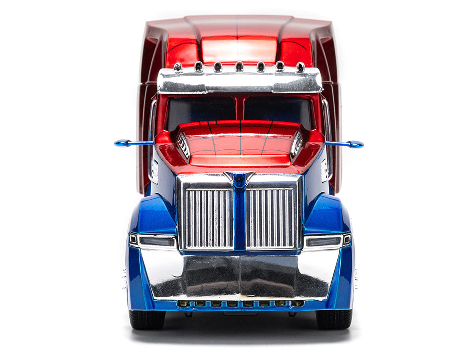 Blue and red metallic Western Star 57X truck tractor diecast model by Jada from Hollywood Rides series, detailed 1/24 scale.