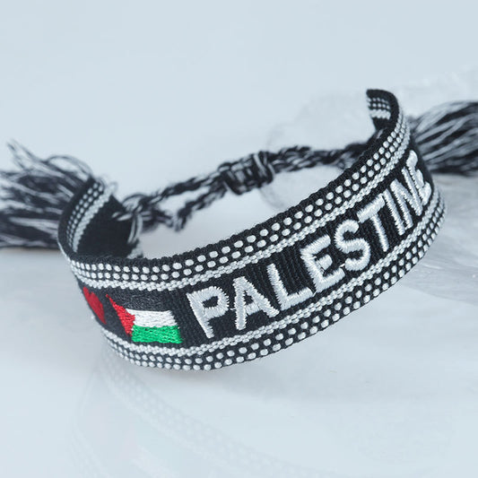 Embroidered Eiffel Tower woven wrist strap by eprolo featuring ethnic style design, souvenir from France for Paris sports events