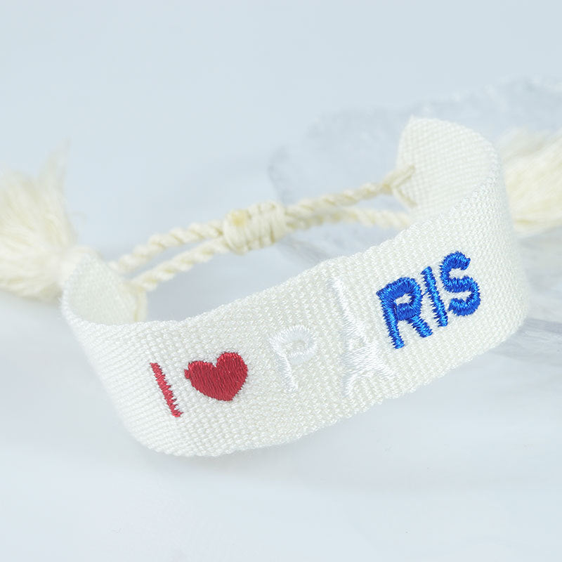 Embroidered Eiffel Tower woven wrist strap by eprolo, featuring ethnic design and Paris souvenir motif, ideal for sports and games.