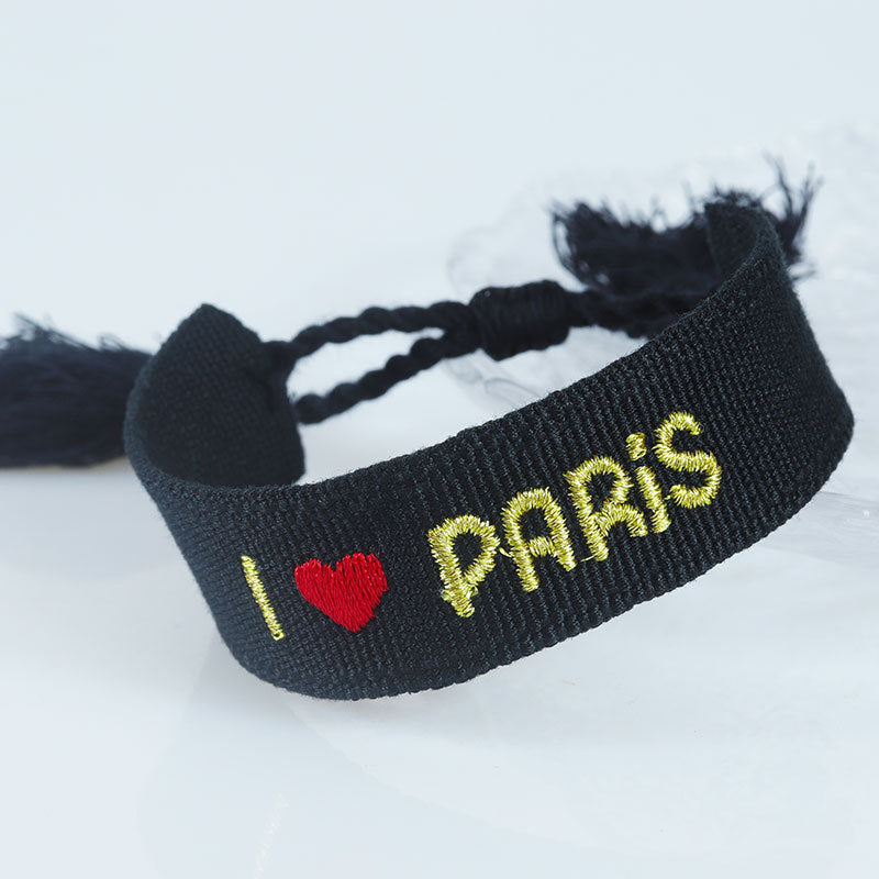 Embroidered Eiffel Tower woven wrist strap by eprolo featuring ethnic embroidery and Paris-themed design, ideal for sports or souvenirs.