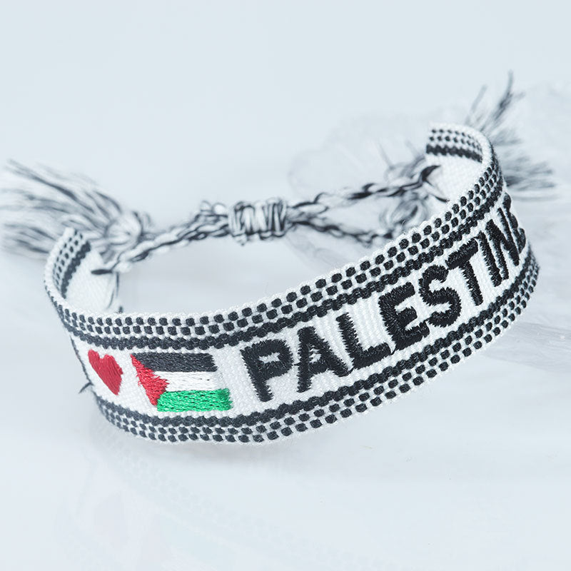 Embroidered Eiffel Tower woven wrist strap by eprolo, featuring Paris-themed ethnic design, perfect as a souvenir or sports wristband.