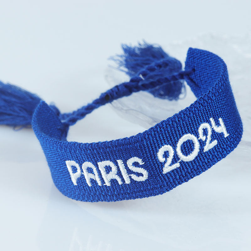 Embroidered Eiffel Tower woven wrist strap from eprolo featuring Paris-themed design, ideal as a souvenir from France.