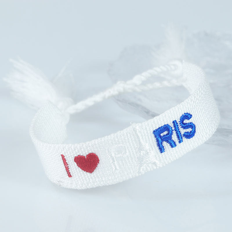Embroidered Eiffel Tower woven ribbon wrist strap featuring Paris-themed design, ideal for sports games or souvenirs from France.