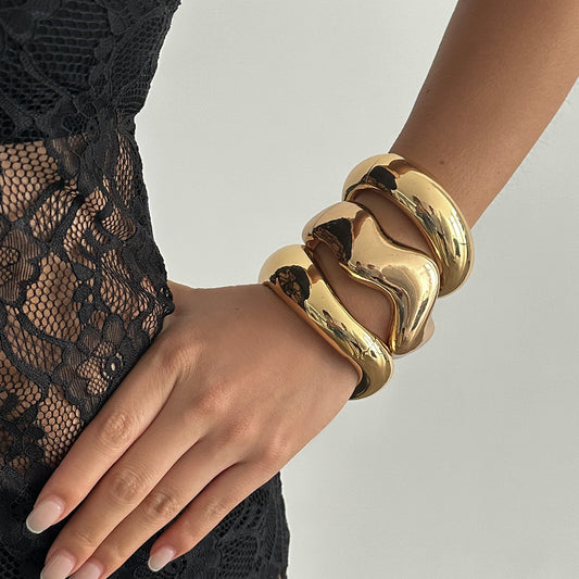 Eprolo metal curved spring bracelet and casual irregular bracelet set with sleek, modern design and metallic finish.