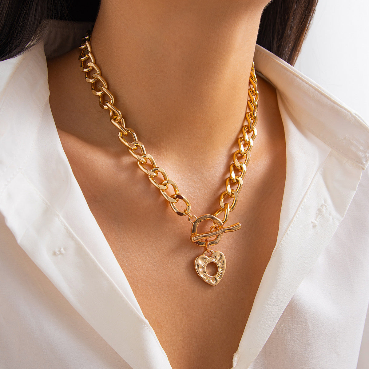 Lava hollowed out heart-shaped pendant necklace with punk metallic chain, designed for collarbone, by eprolo.