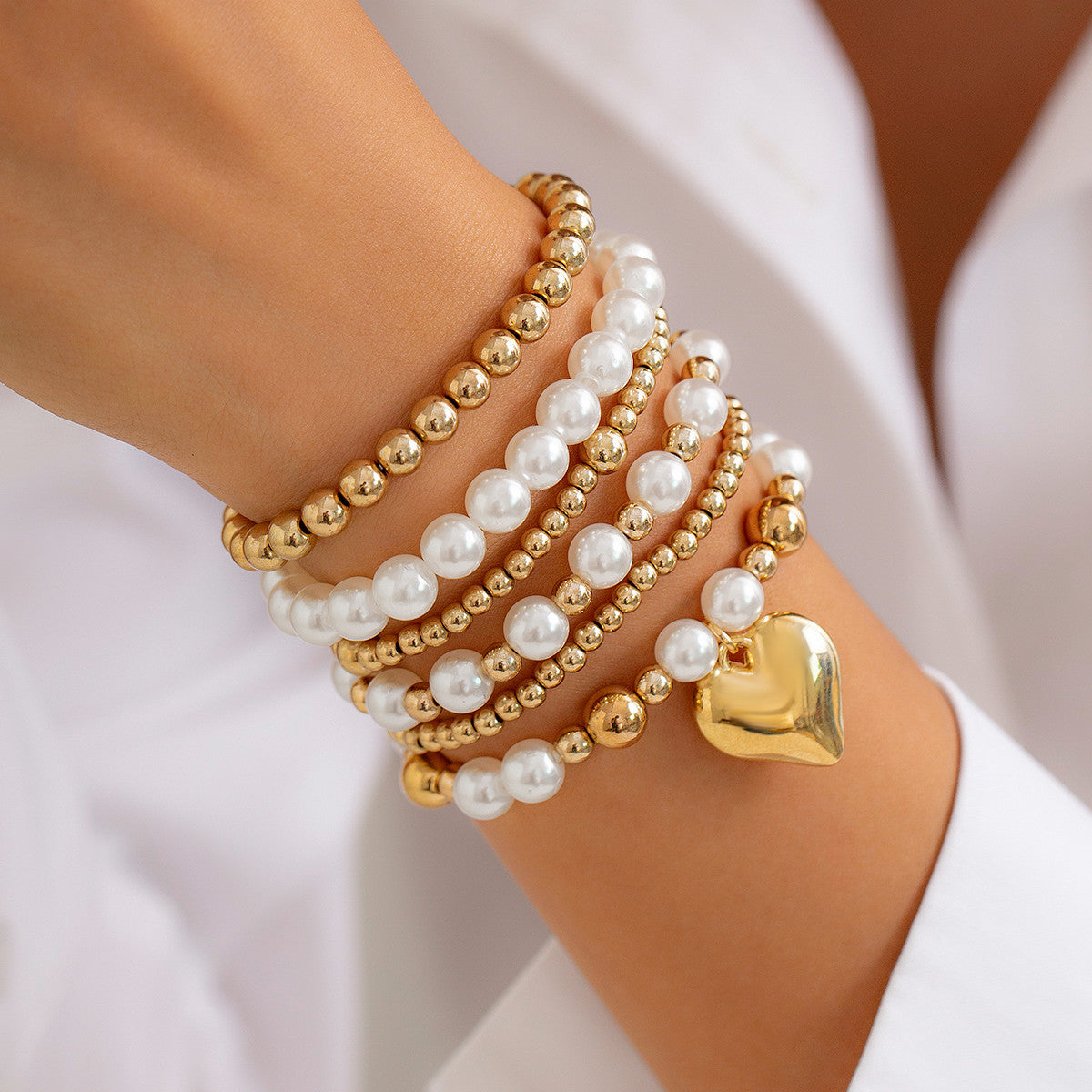 Eprolo minimal pearl bead bracelet with a heart-shaped hollow design, stylish and elegant accessory for everyday wear