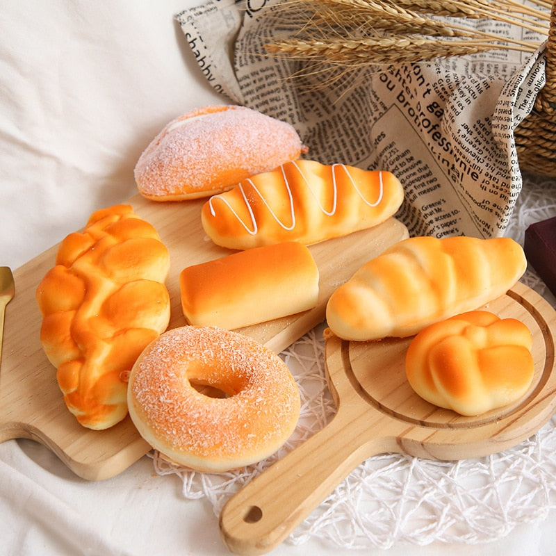 Eprolo squishy bread toast and donuts stress relief toys, slow-rising foam desktop decorations, colorful and realistic in appearance.