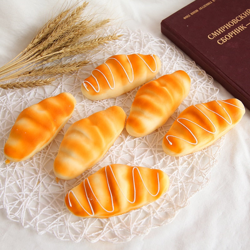Eprolo squishy food toy set featuring realistic bread, toast, and donuts for stress relief and desktop decoration.