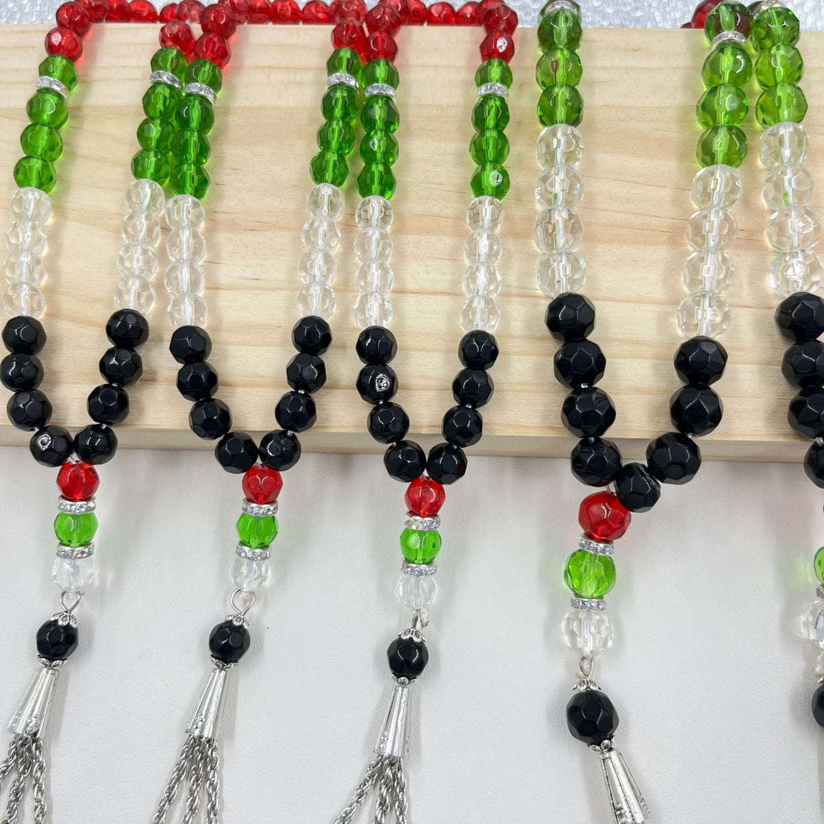 Eprolo 33 prayer beads with Palestinian flag-colored crystal glass, featuring vibrant beads for meditation or spiritual practice.