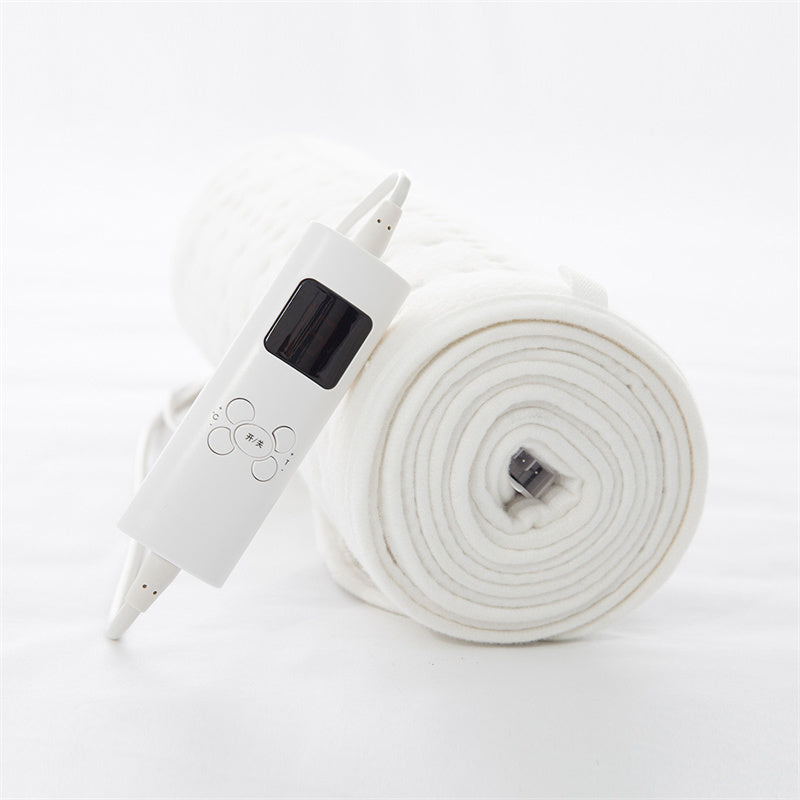 Eprolo ultrasonic intelligent dehumidification and acarid electric blanket spread out on a bed, showcasing its soft fabric and control panel.