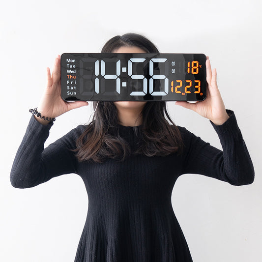 Large LED digital wall clock by eprolo with remote control, temperature, date, week display, timer, and dual alarm functions.