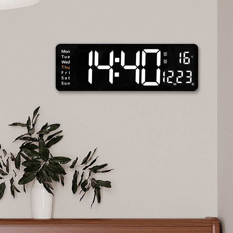 Large LED digital wall clock by eprolo with remote control, temperature, date, week display, timer, and dual alarms mounted on wall.