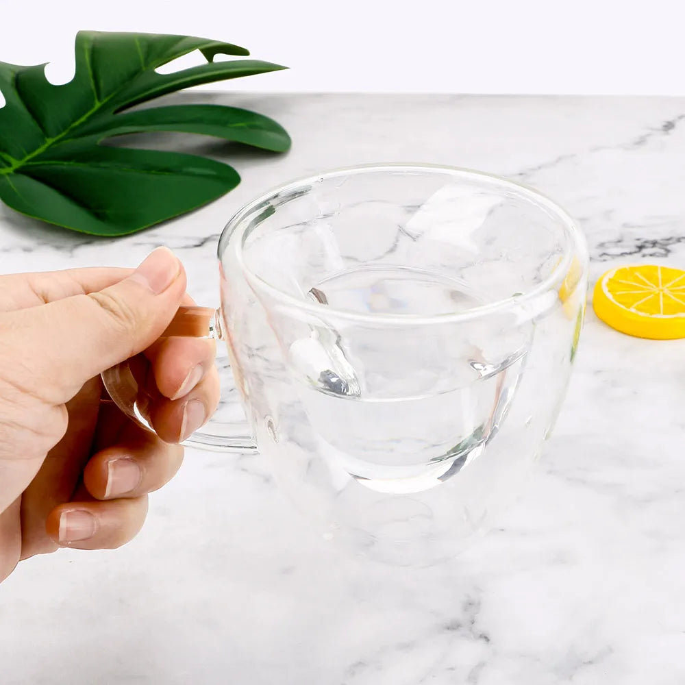 Eprolo heart-shaped double-layer glass mug filled with tea or juice, heat-resistant drinkware for coffee or beverages.