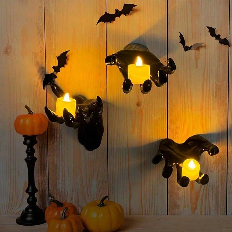 Set of 12 Gothic Halloween bat stickers and spooky hands wall hangings with lit candles, perfect for indoor gothic decor.