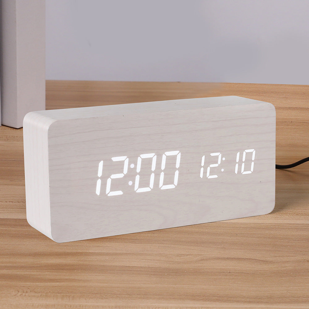 Eprolo PVC wooden digital clock with LED display, thermometer, alarm, and night light, designed for bedside use and multi-functionality.